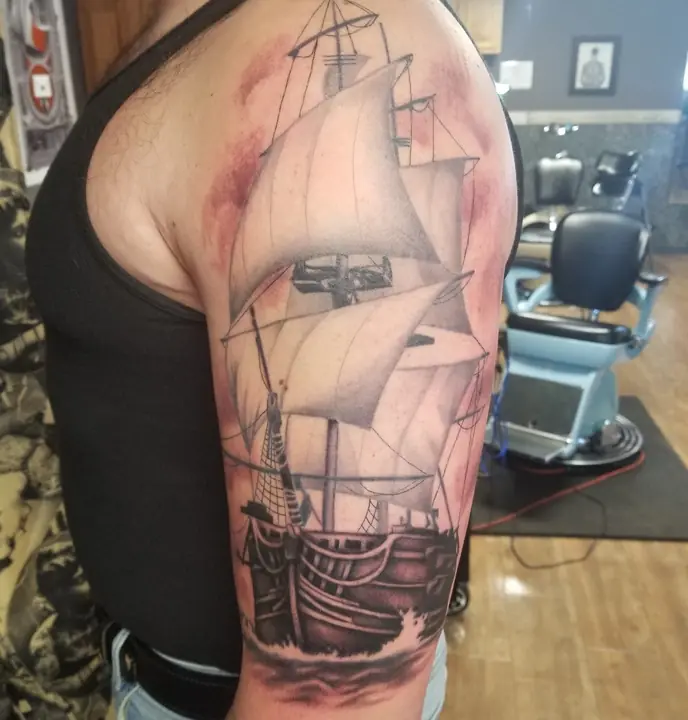 Tall ship at sea — tattoo by Anna Carlson
