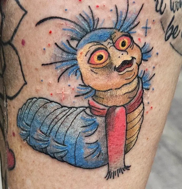 Illustrative worm character by Keira Geneva